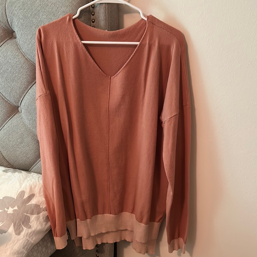 Soft lightweight top by Petal Dew.  V neck & color blocking detail around bottom